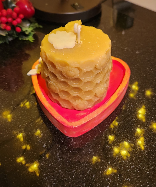 Stacked honeycomb candles on a heart-shaped tray