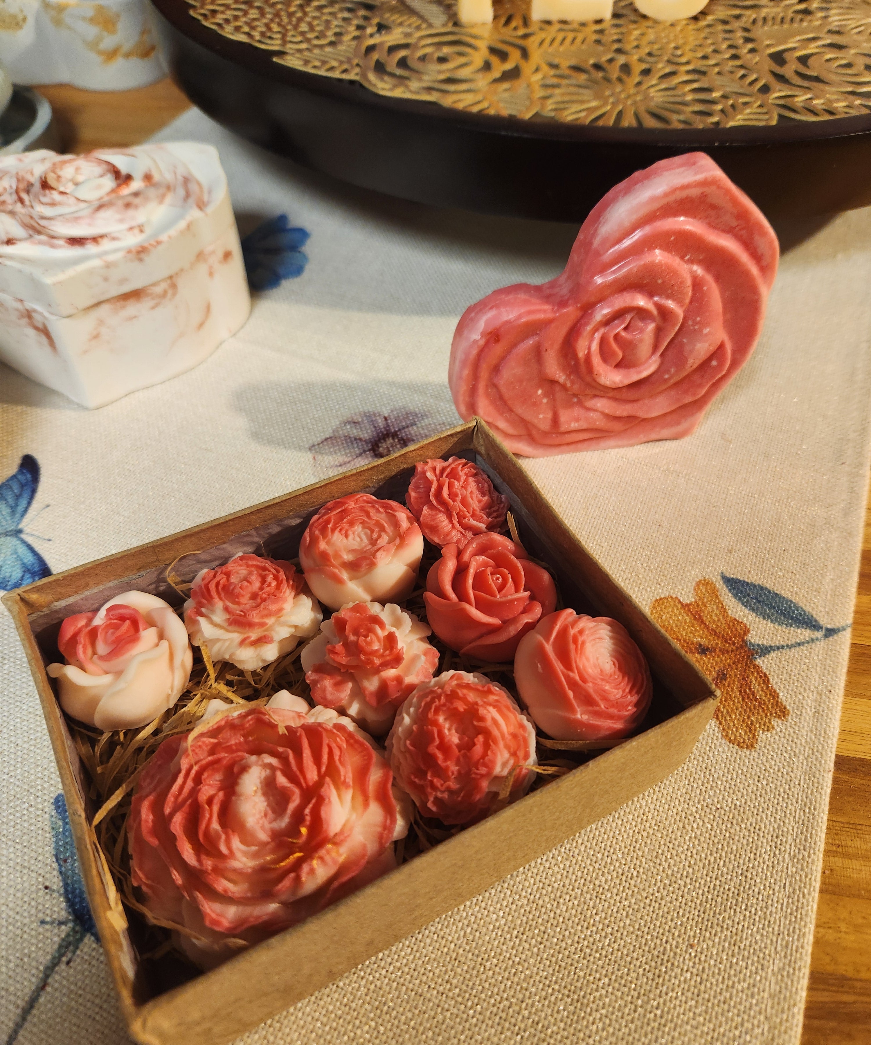 Box of decorative flower shaped wax melts 